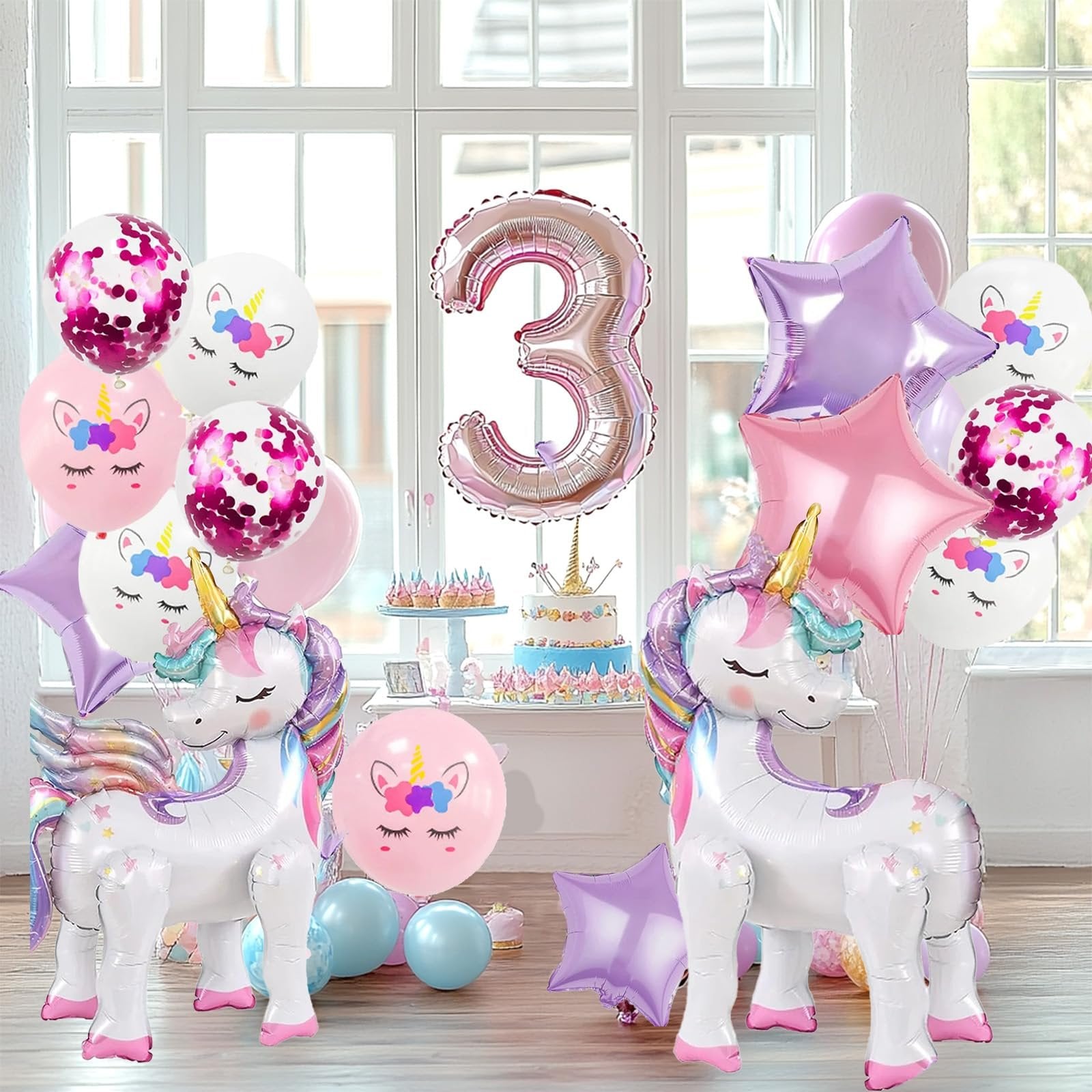 Unicorn balloon kit with two large unicorn foil balloons, a number 3 balloon, star balloons, and printed latex balloons.