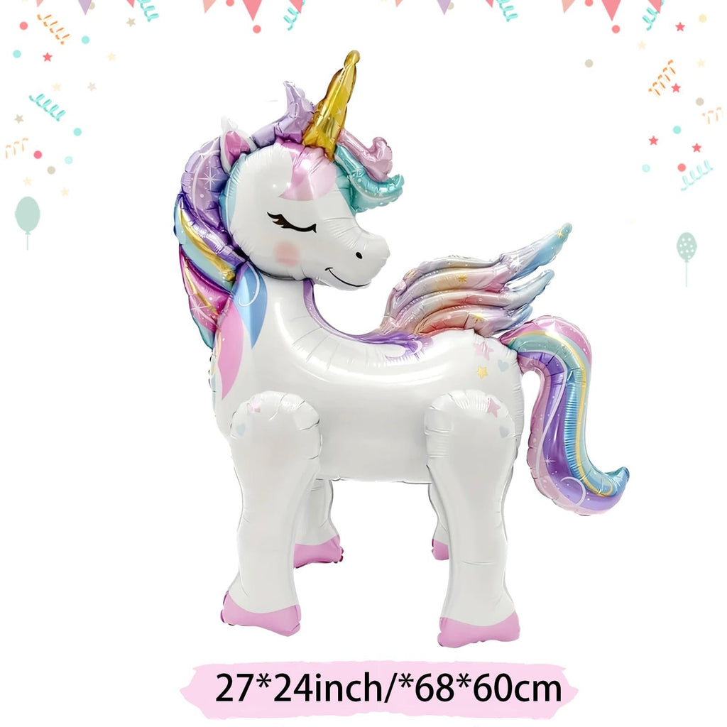 Self-standing 3D foil unicorn balloon with rainbow mane and wings, on white background with festive streamers.