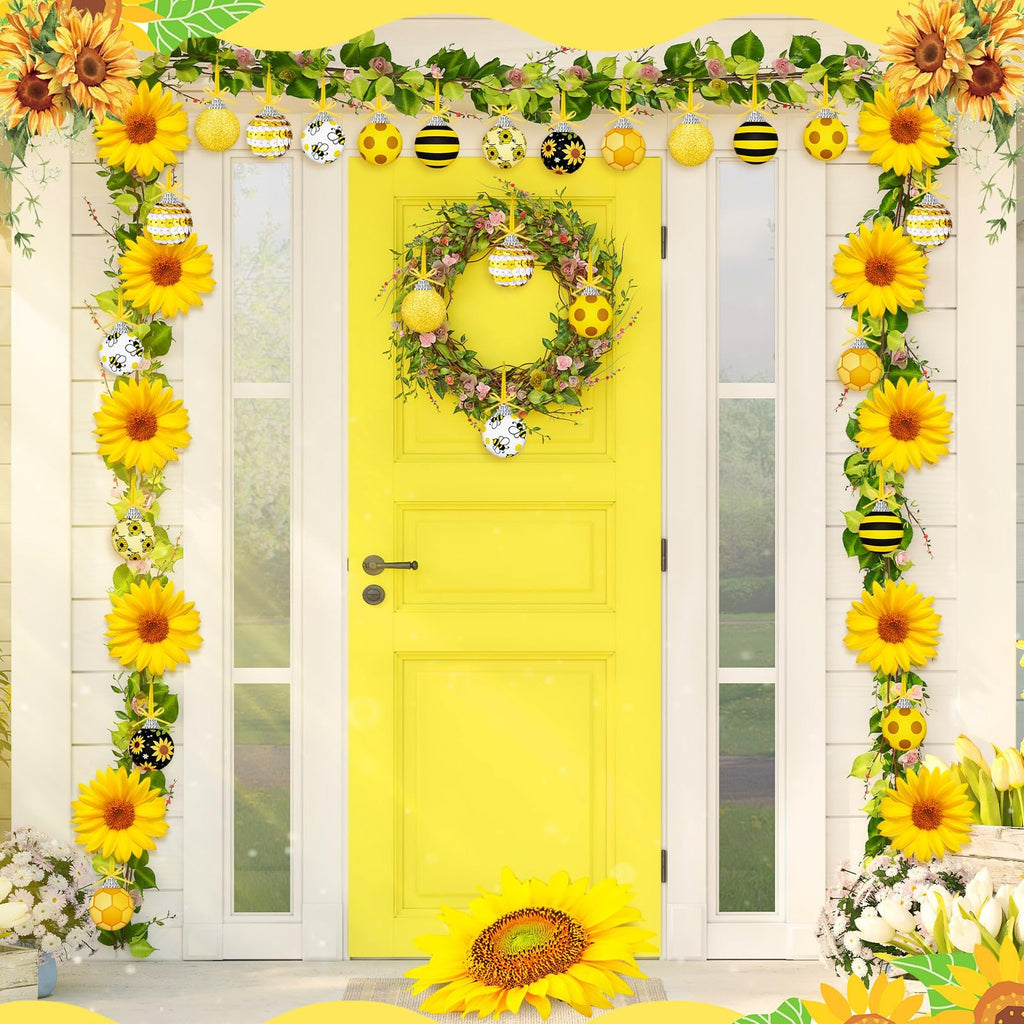 Yellow door decorated with sunflowers, garland, and bee-themed ornaments for a festive outdoor display.