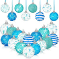 Collection of 16 coastal beach ball ornaments with ocean-themed designs and ribbon hangers.