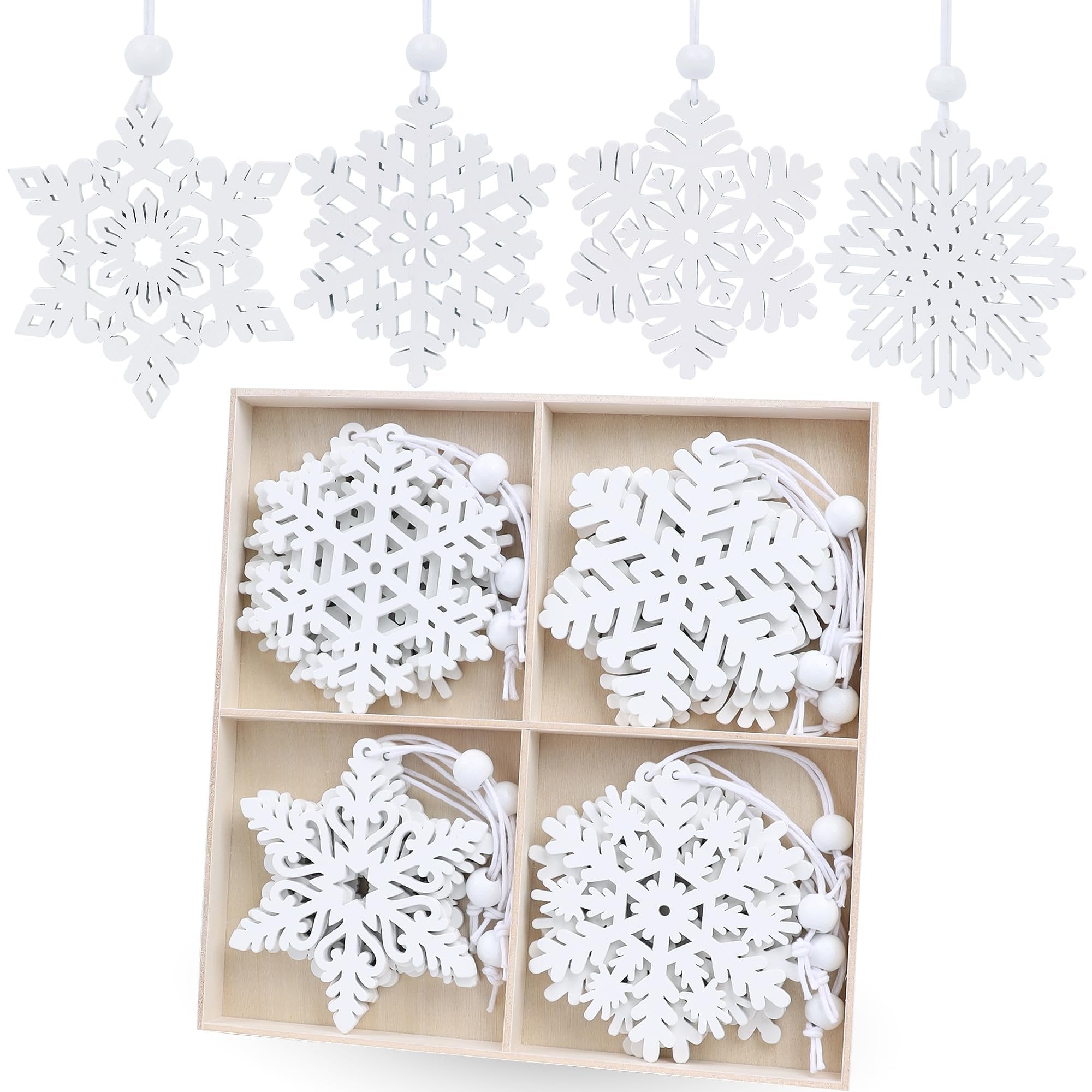 Set of 16 white wooden snowflake ornaments in 8 styles, shown hanging and in a wooden box.