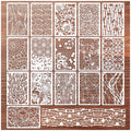 Collection of 16 white abstract texture stencils with various patterns, laid out on a wooden background.