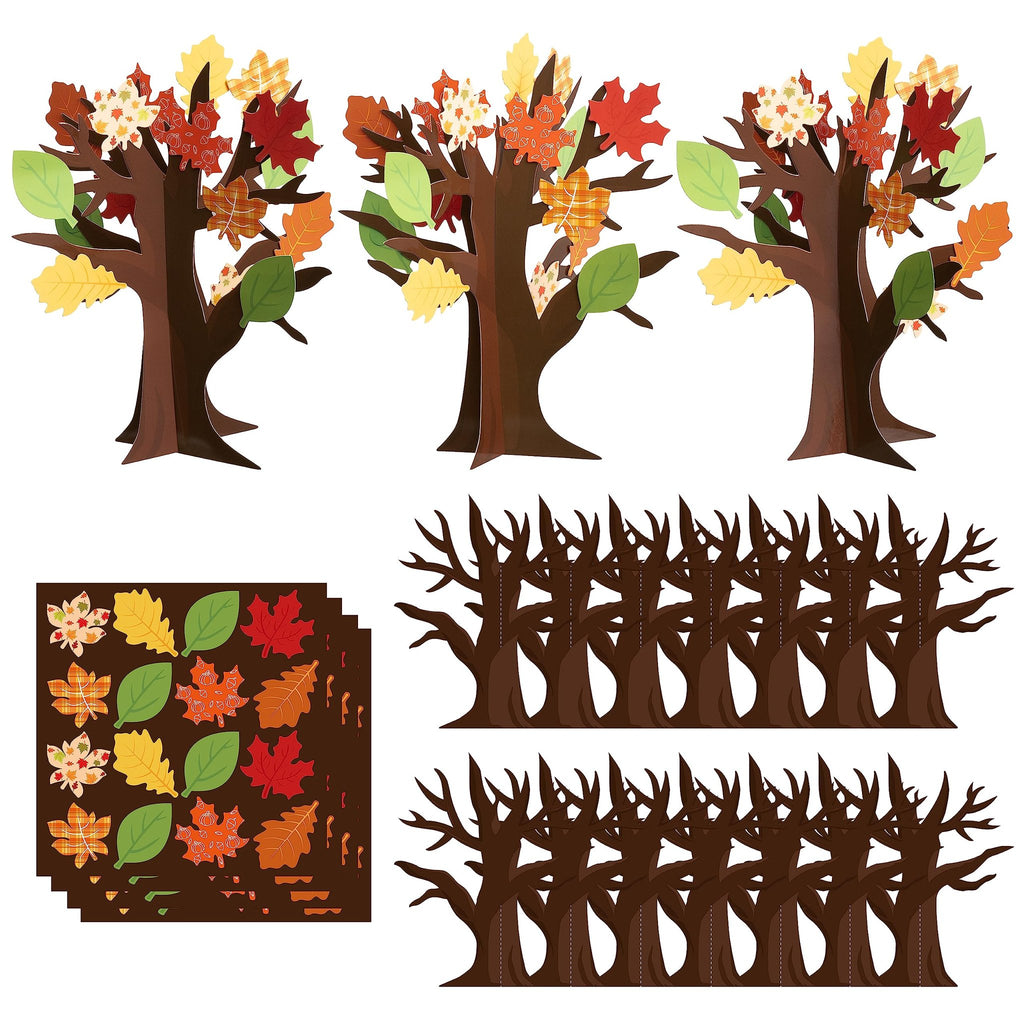 Fall thankful trees craft kit components including assembled trees, leaf cards, and tree trunk cards.