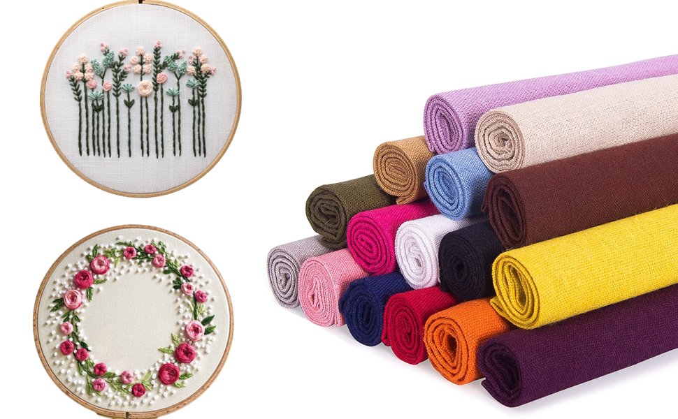 Two embroidered hoops and a stack of rolled fabric squares in various colors