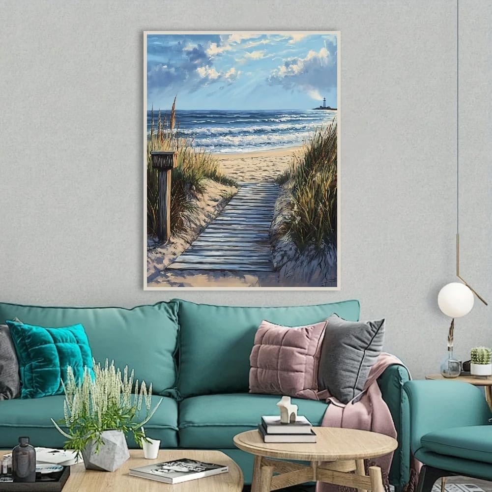 Diamond painting kit depicting a wooden boardwalk leading to a sandy beach with a lighthouse in the distance.