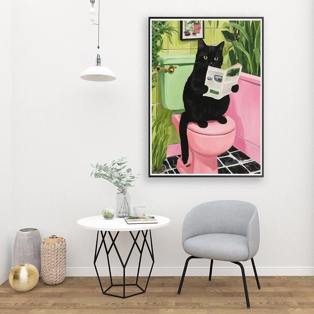 Black cat sitting on a pink toilet reading a newspaper in a bathroom setting.