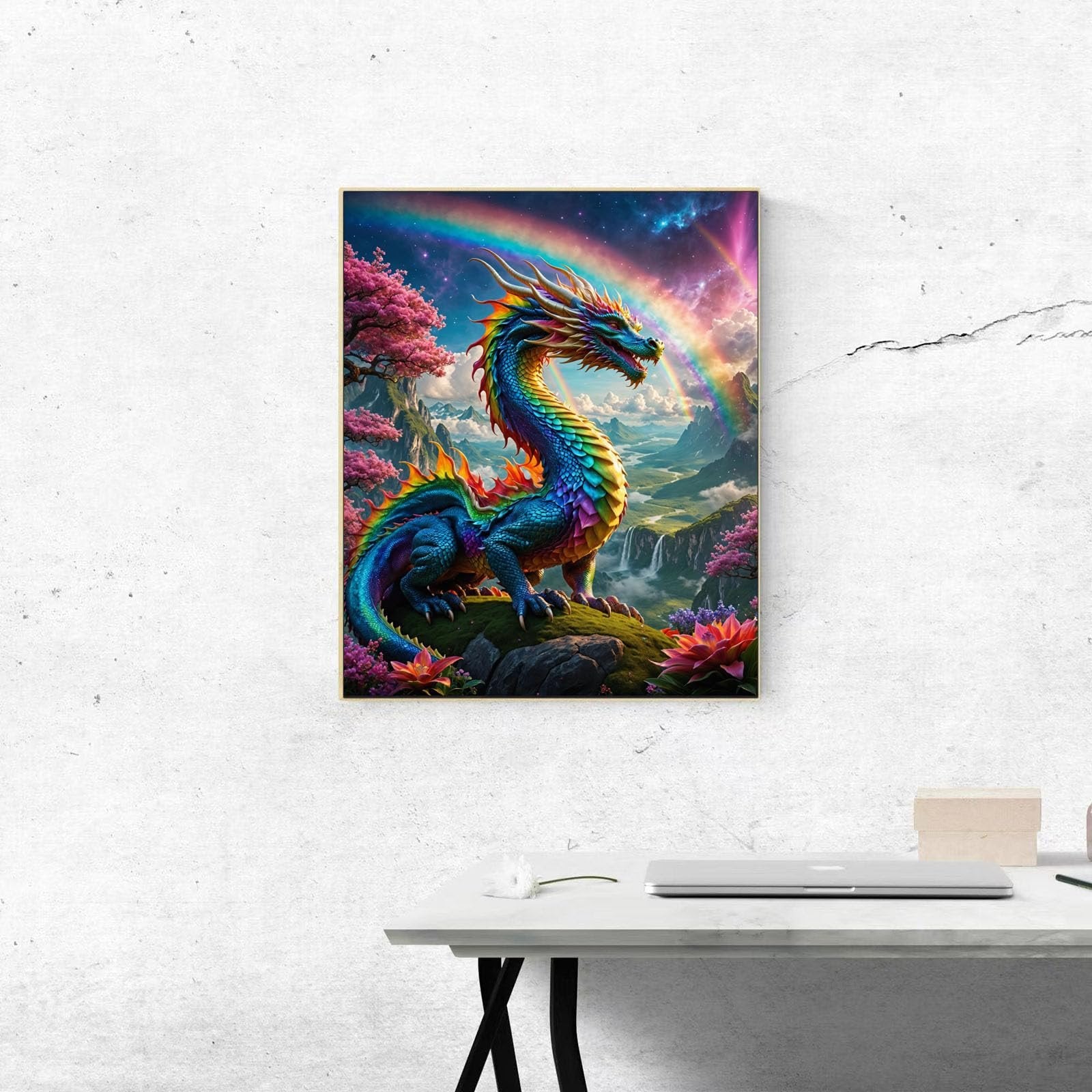 Colorful dragon painting on canvas with rainbow and landscape background, framed and hanging on a wall above a desk.