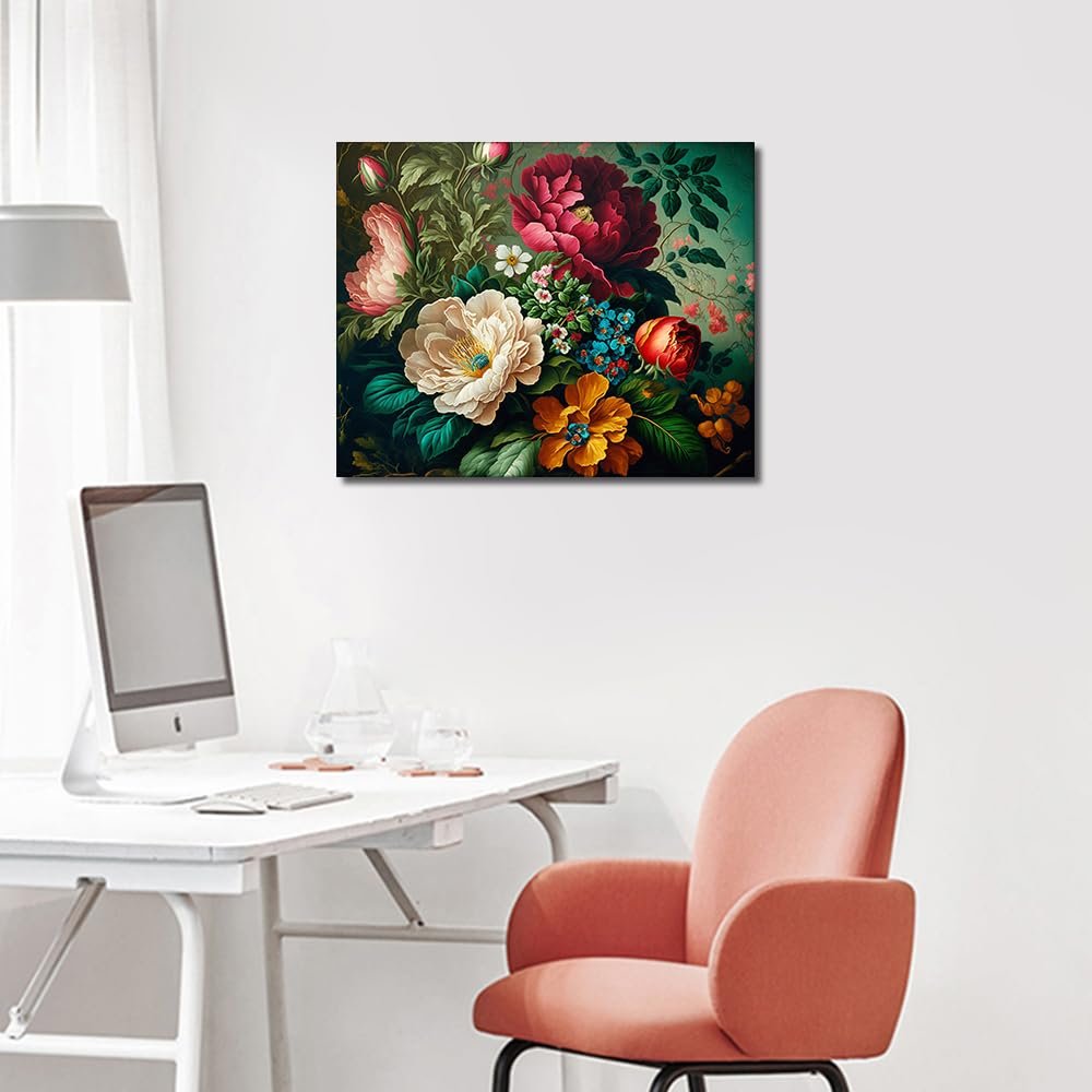 A framed painting of a lush floral arrangement with peonies and other flowers hangs on a wall above a desk with a computer and chair.