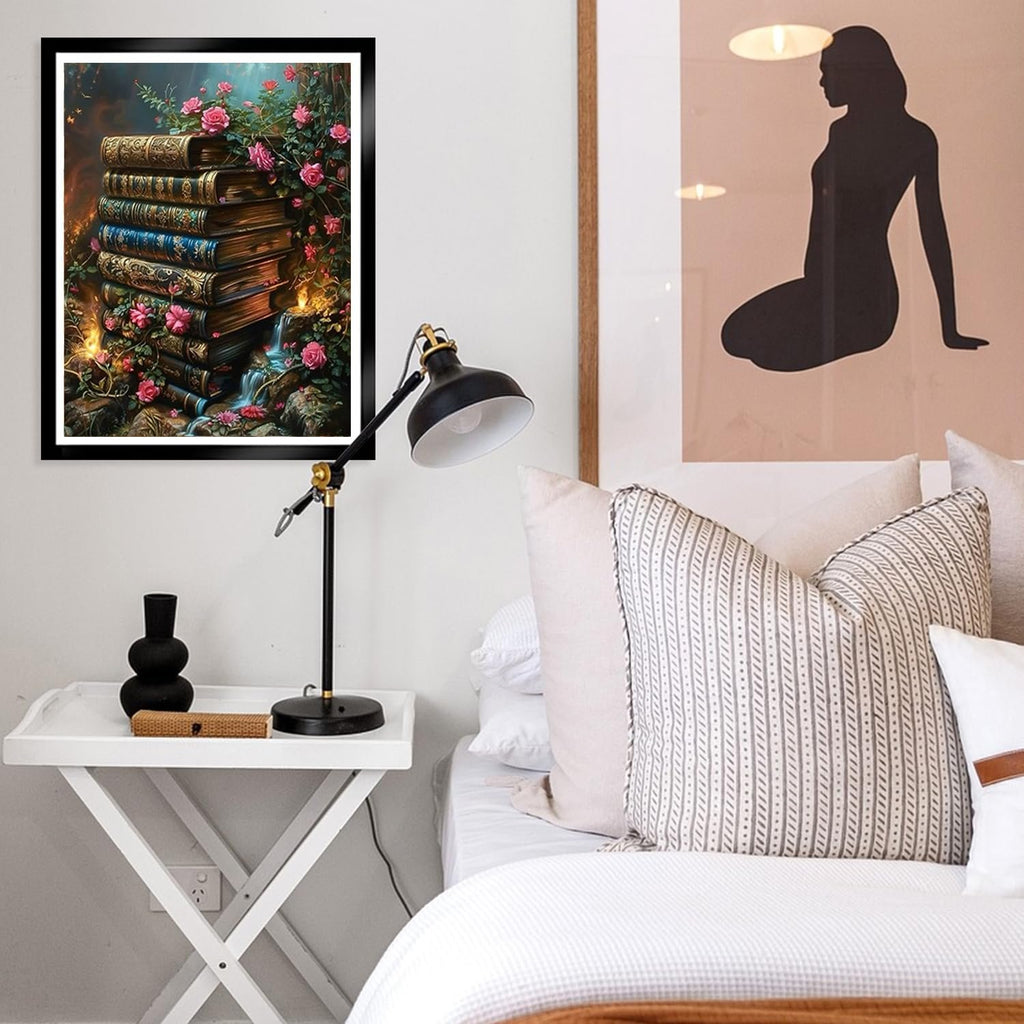Paint by numbers canvas showing a stack of antique books with pink roses and a waterfall.