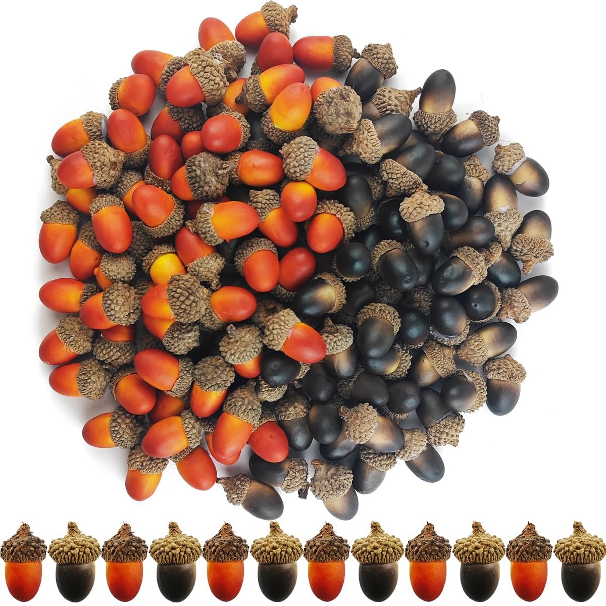 Pile of artificial acorns in orange, black, and natural colors with caps, arranged on a white background with a row of acorns below.
