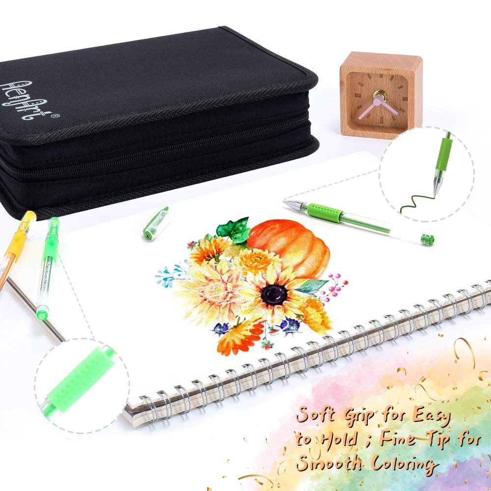 Gel pens and drawing supplies laid out with a sketchpad showing a floral and pumpkin illustration.