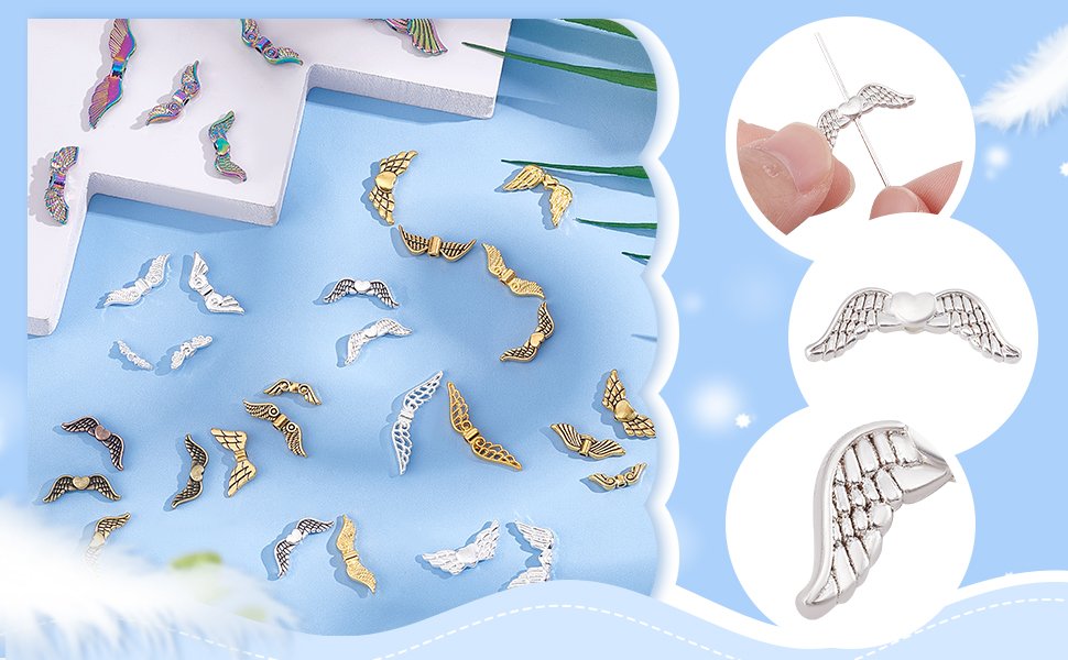 Assortment of angel wing metal spacer beads in silver and gold tones, some with iridescent finish, for jewelry making.
