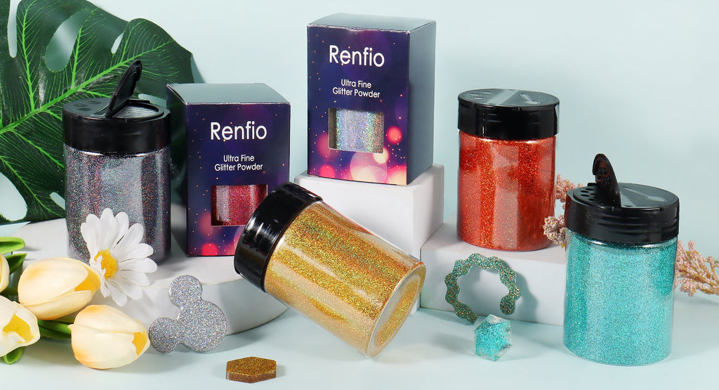 Assortment of glitter powder containers and decorative shapes on a light blue background with floral accents.