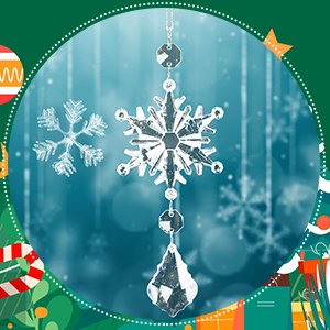Crystal snowflake and icicle ornaments hanging with a blurred winter background and festive border.