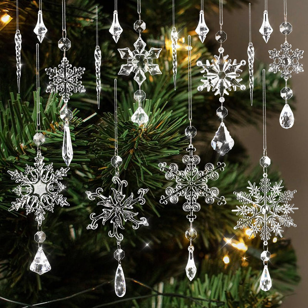 Clear crystal snowflake and icicle ornaments hanging on a Christmas tree with bokeh lights