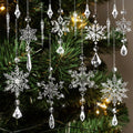 Clear crystal snowflake and icicle ornaments hanging on a Christmas tree with bokeh lights