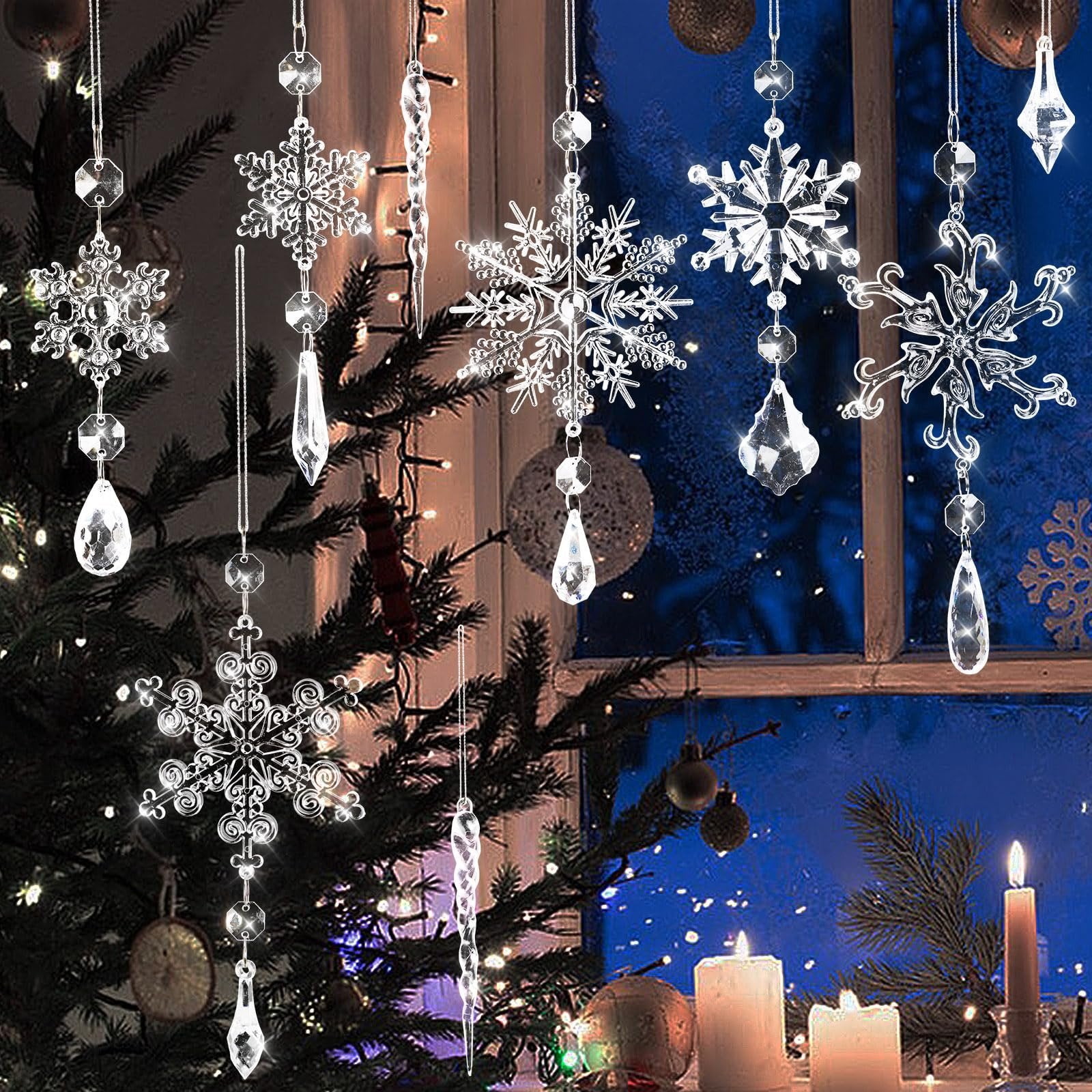 Crystal snowflake and icicle ornaments hanging in front of a window with Christmas lights and candles