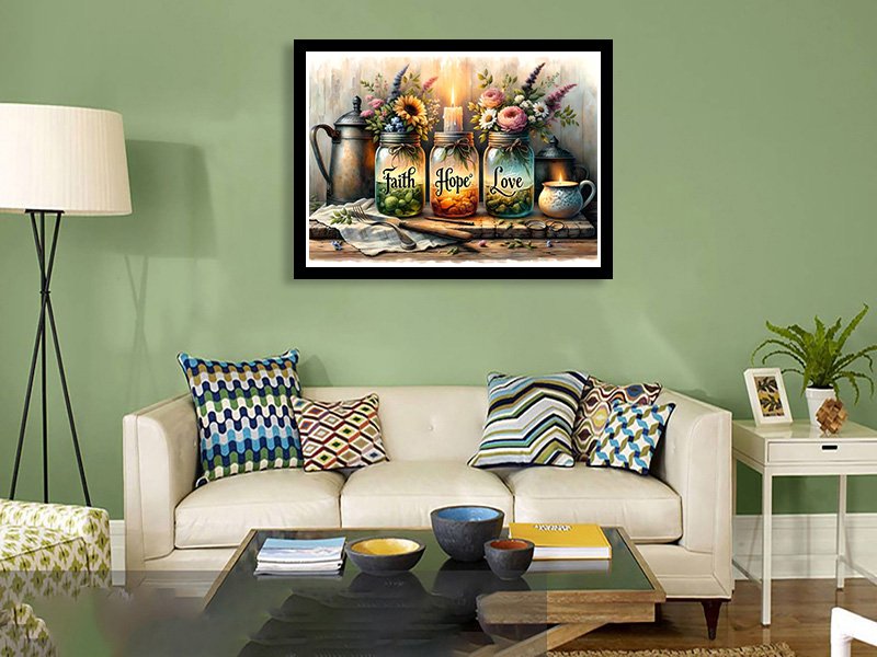 Diamond painting kit with jars labeled Faith, Hope, Love, flowers, and a candle, displayed in a living room setting.