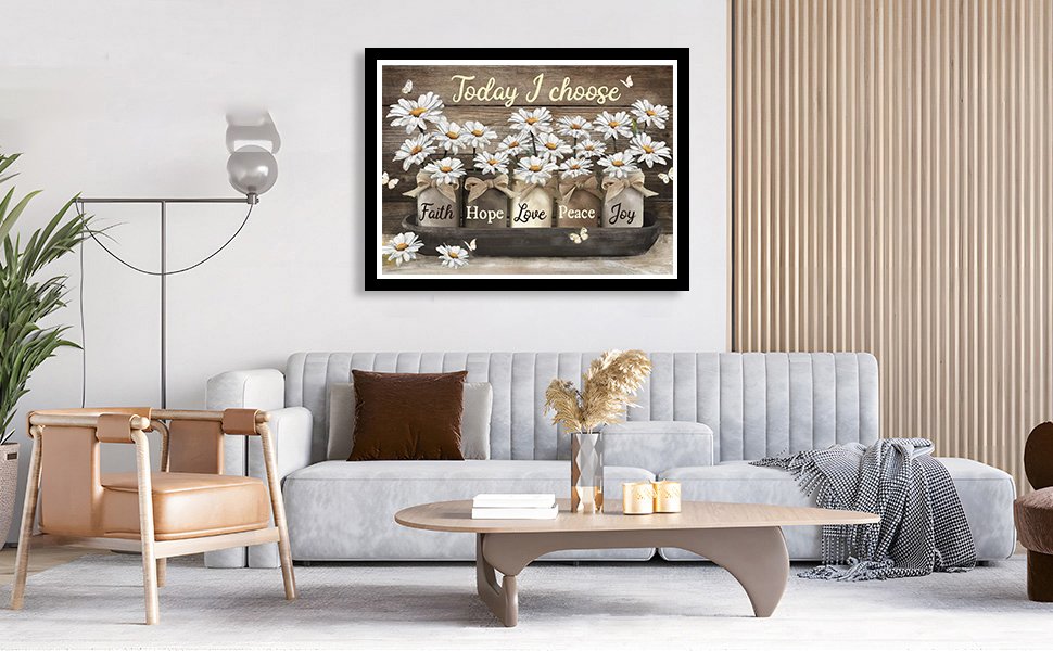 Diamond art painting of daisies in jars with inspirational words, displayed above a sofa.