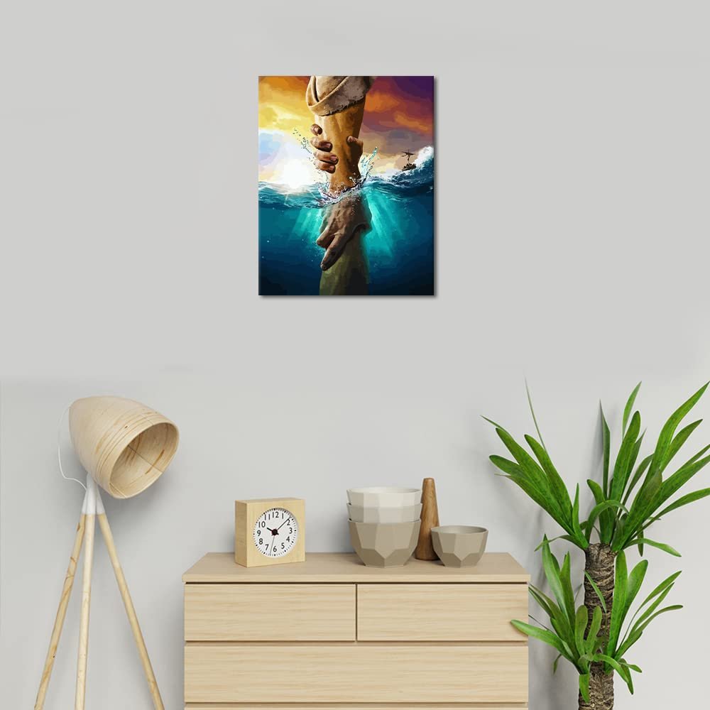 Paint by numbers kit depicting two hands reaching for each other in water with a sunset sky and a boat in the background.