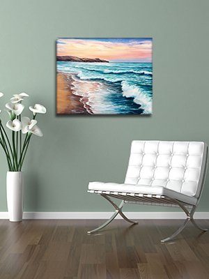 16x20 inch beach landscape painting hanging on a wall above a modern white chair, with a vase of white flowers to the left.