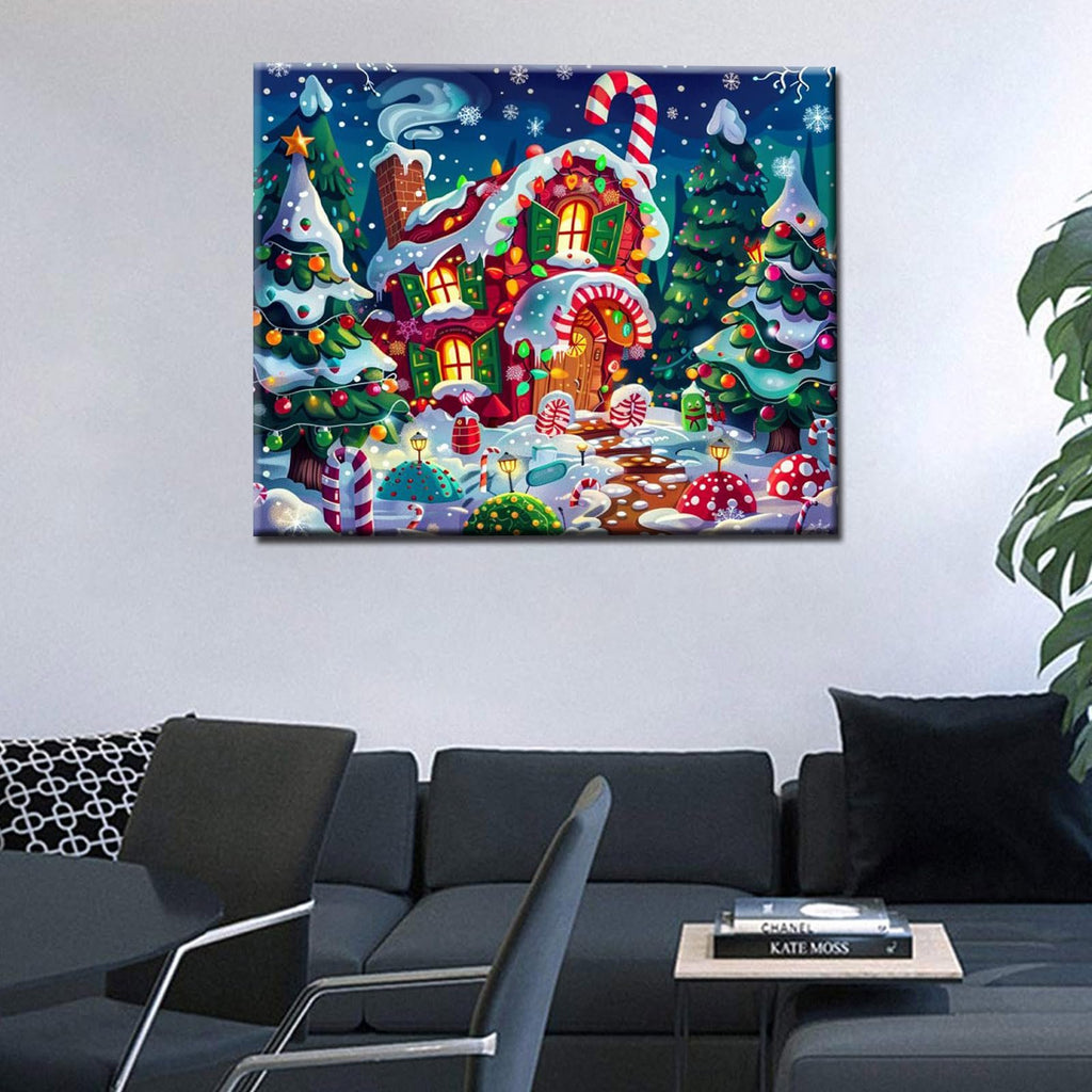 Christmas candy house paint by numbers kit artwork displayed on a wall above a sofa