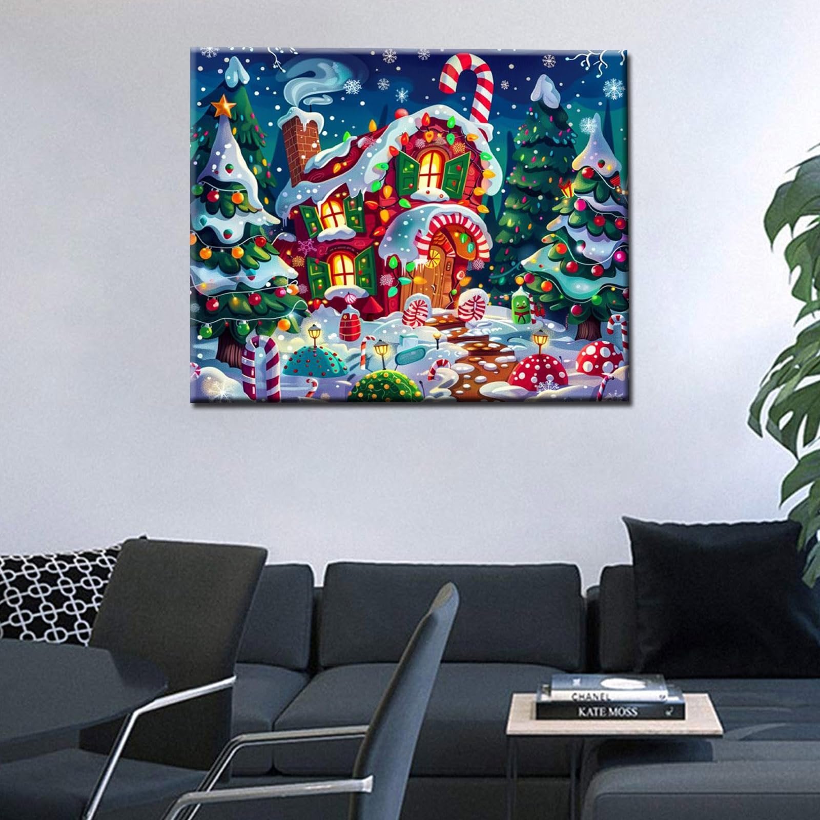 Christmas candy house paint by numbers kit artwork displayed on a wall above a sofa