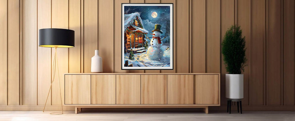 Christmas paint by numbers kit showing a snowman and cabin in a snowy landscape at night