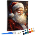 Paint by numbers kit featuring a close-up portrait of Santa Claus with a snowy background, includes brushes and paint pots.