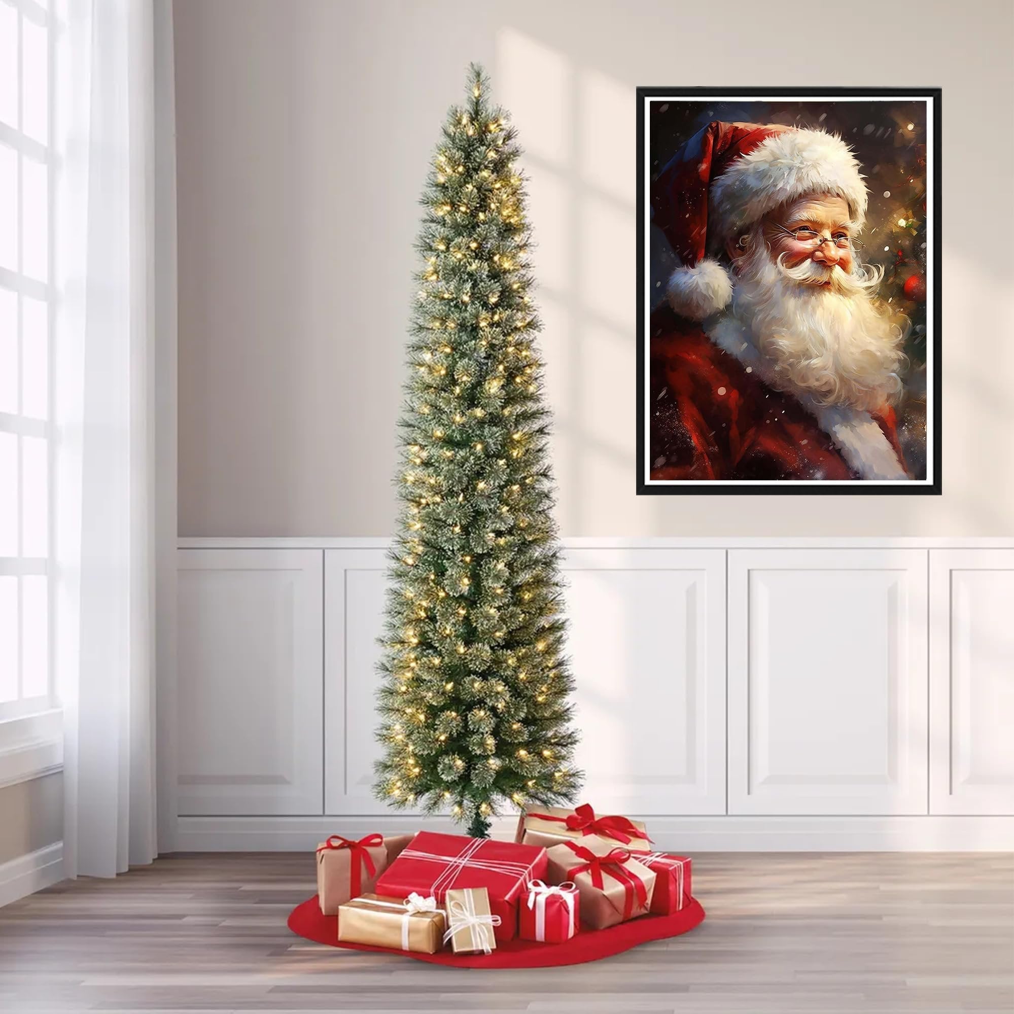 Christmas tree with lights and gifts under it, with a framed painting of Santa Claus on the wall