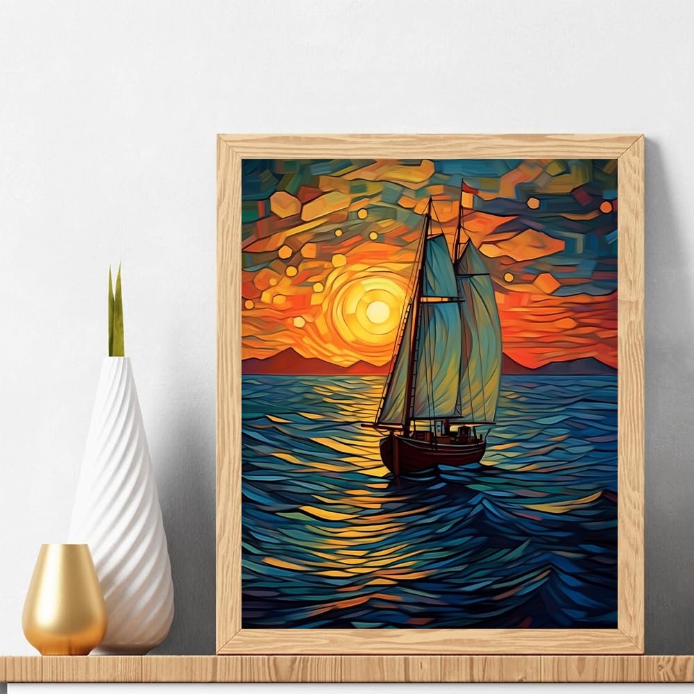 Paint by numbers artwork of a sailboat on the ocean at sunset, framed in wood.