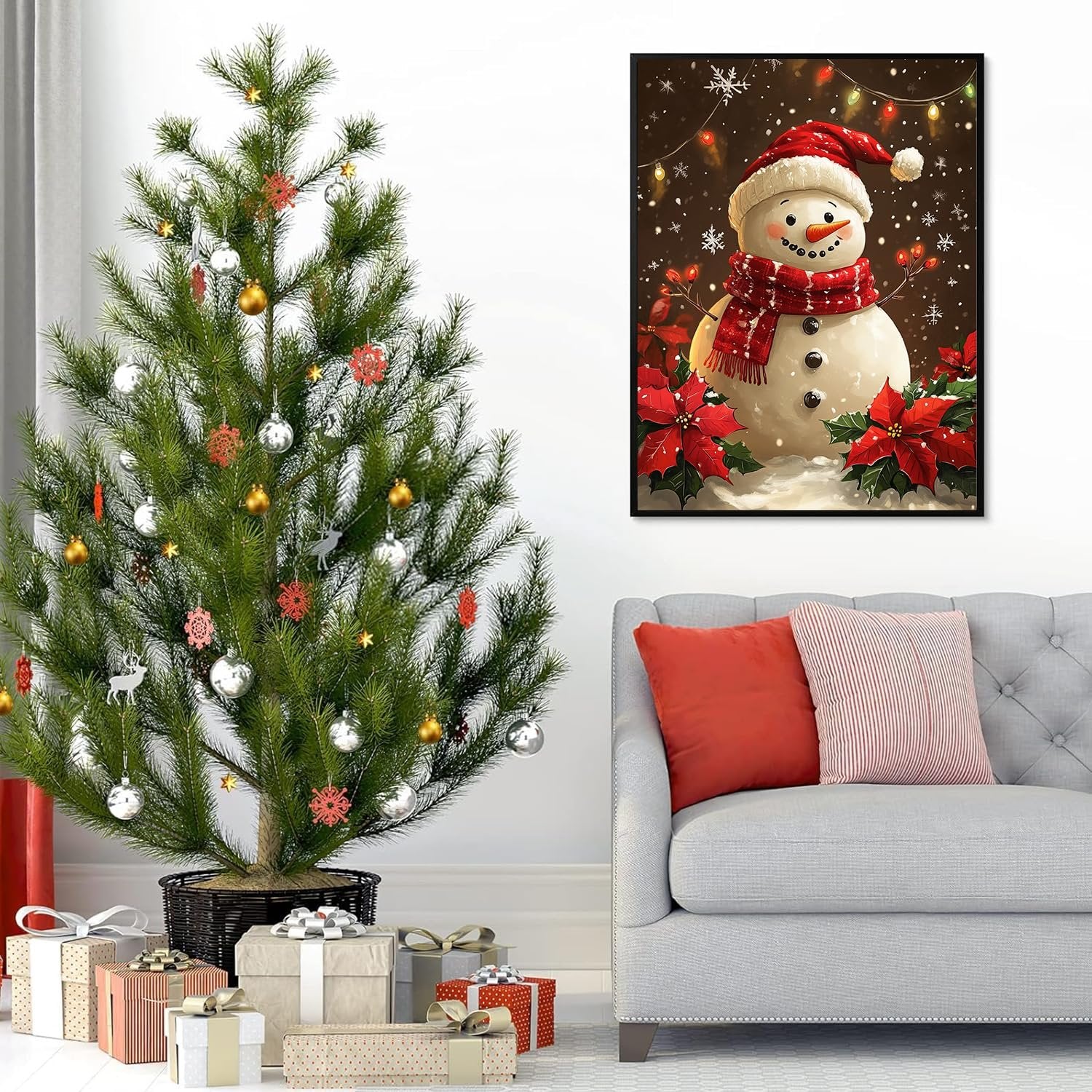Christmas tree with gifts and a framed snowman painting on a wall above a sofa
