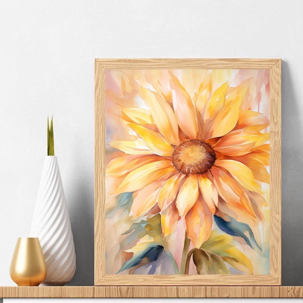 Framed watercolor painting of a large sunflower with yellow and orange petals, set on a shelf next to decorative vases.