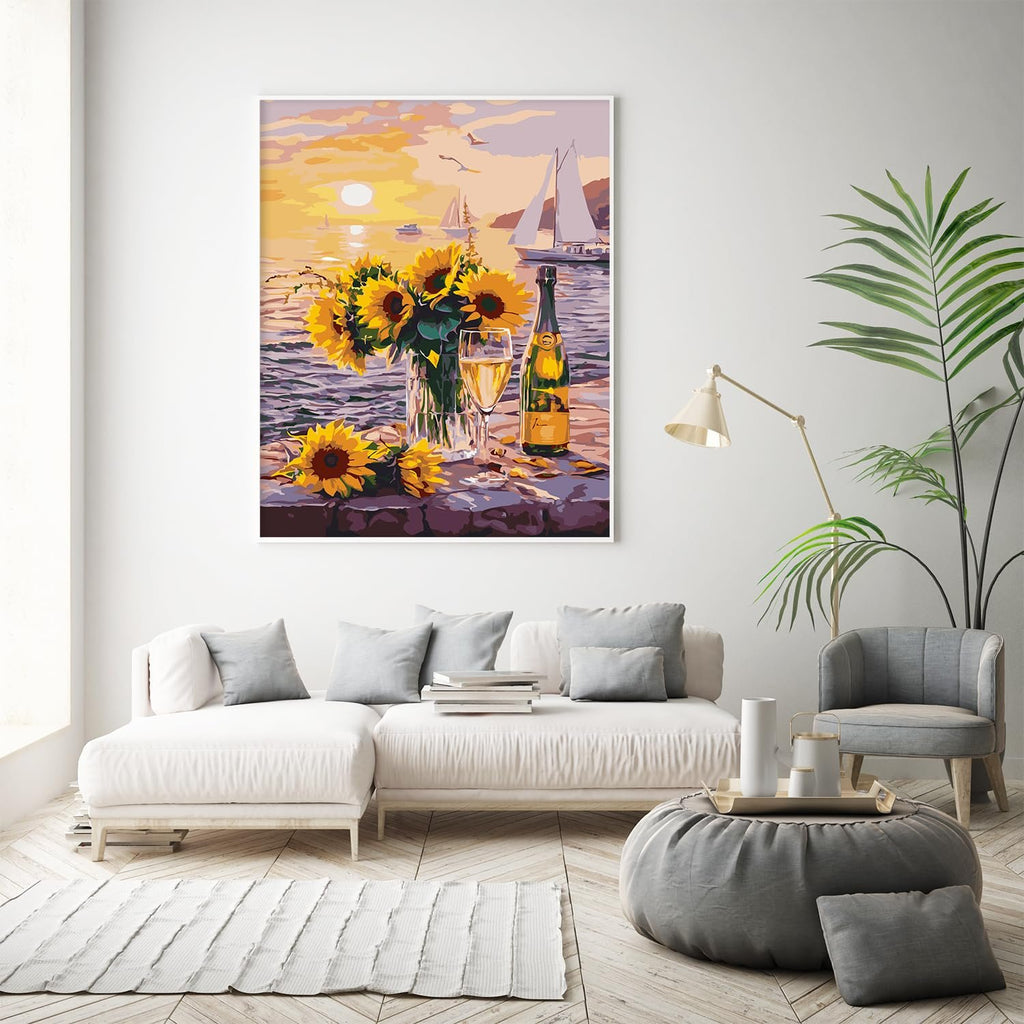 Paint by numbers artwork of sunflowers in a vase with champagne by the sea at sunset
