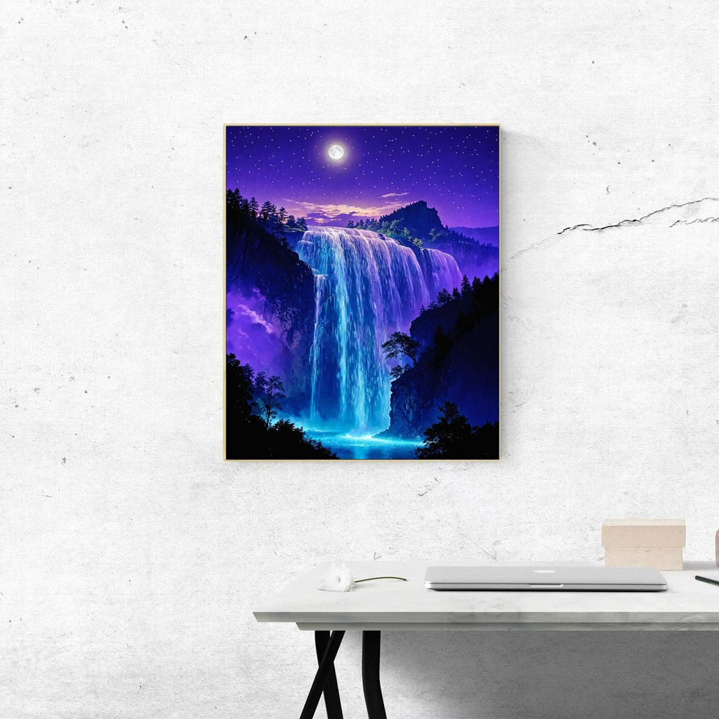 Framed painting of a waterfall at night under a starry sky with a full moon, displayed on a textured wall above a desk.