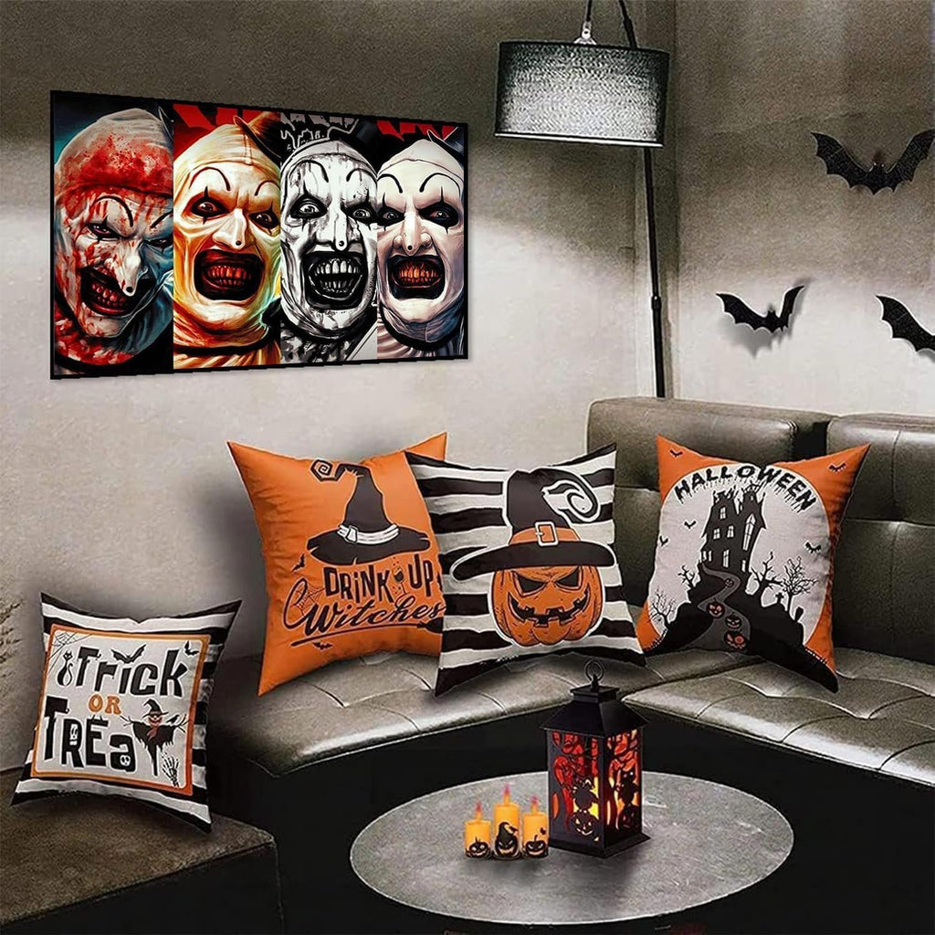 Halloween-themed living room with a painting of four horror clowns and decorative pillows on a sofa.