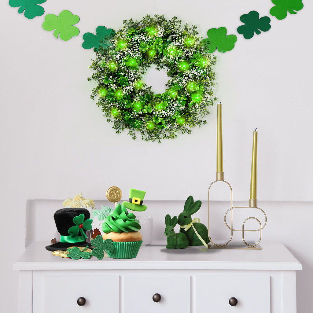 St. Patrick's Day themed decorations including a lighted wreath, cupcake, and shamrock garland