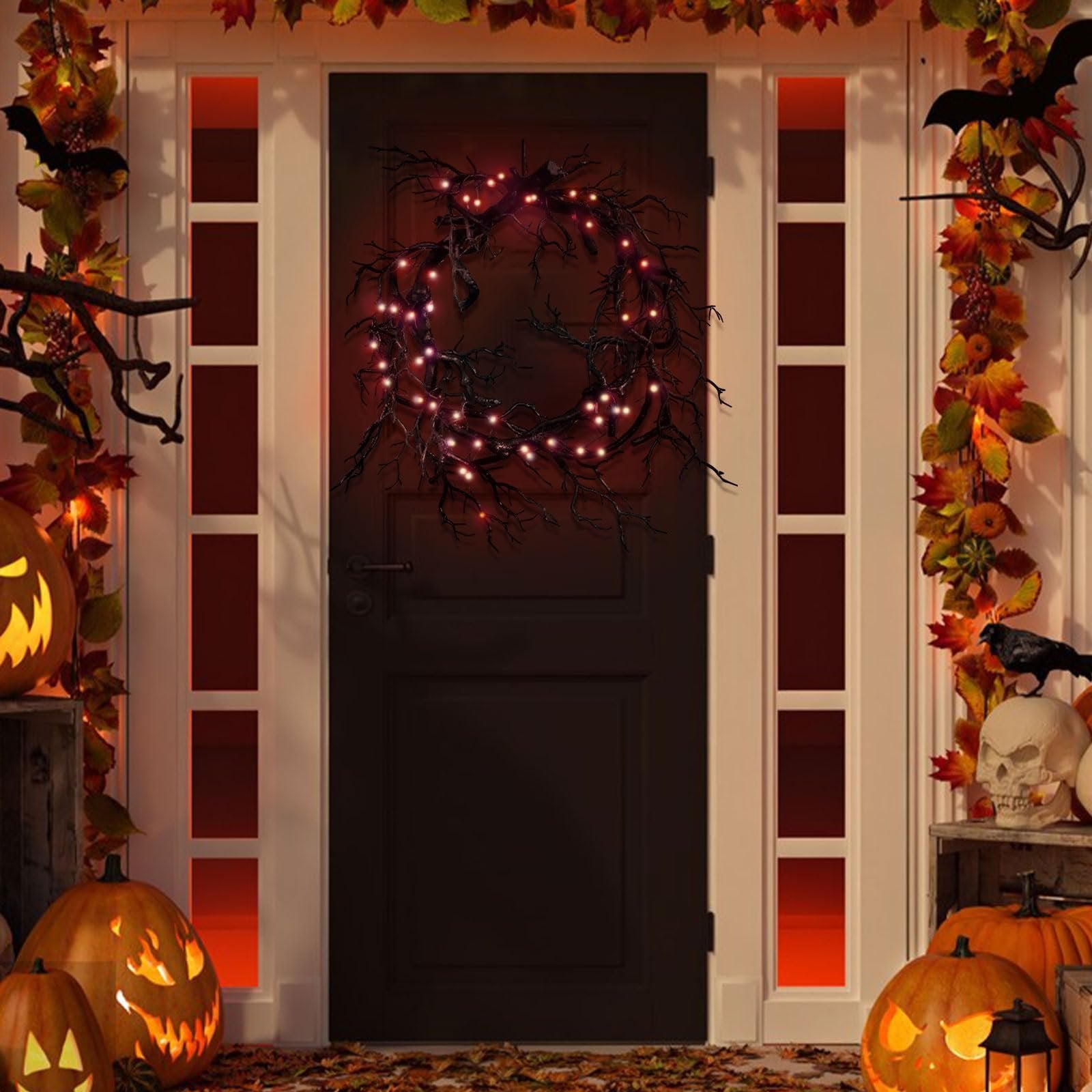 Black twig Halloween wreath with red lights hanging on a dark front door, surrounded by pumpkins and fall foliage.