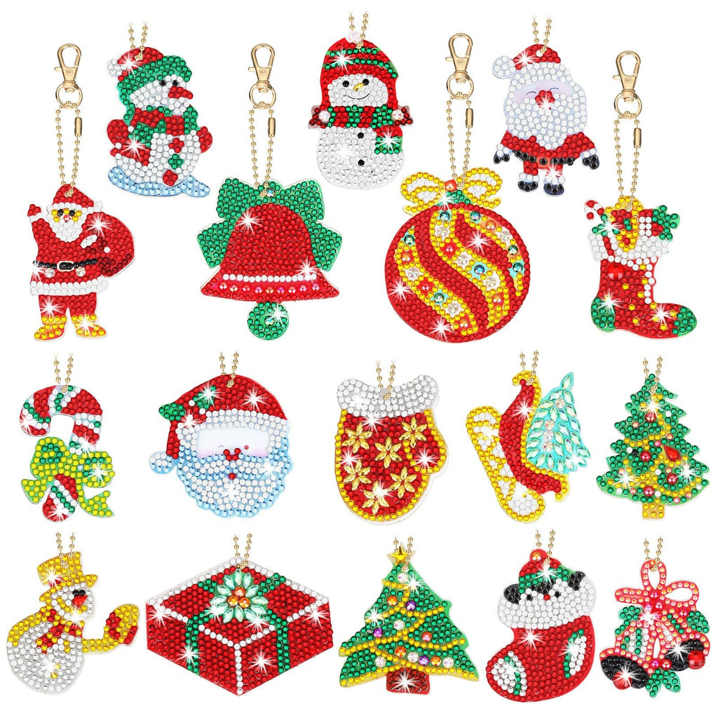 Collection of 17 double-sided diamond art Christmas keychain ornaments featuring Santa, snowmen, bells, ornaments, stockings, candy canes, mittens, sleds, and trees.