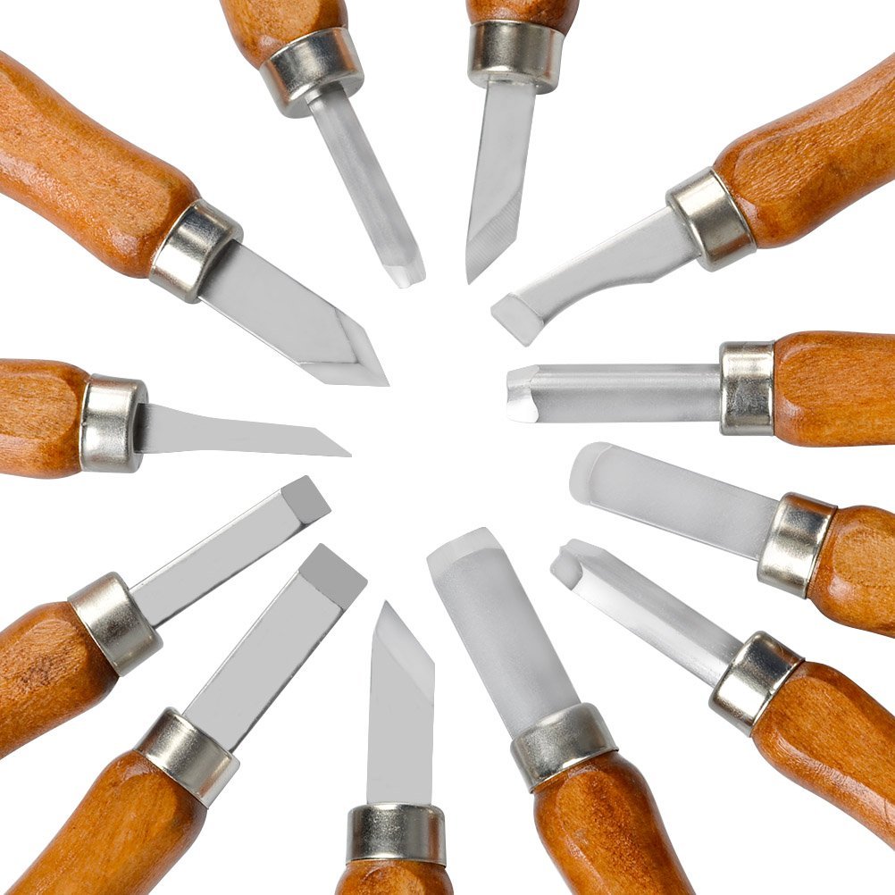 Close-up overhead view of a wood carving tool set with wooden handles and steel blades arranged in a circle.