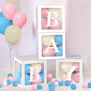 Gender reveal party decorations with stacked baby blocks spelling 'BABY', pink, blue, and cream balloons, and scattered small balloons.