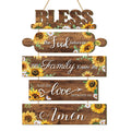 Wooden sunflower kitchen wall sign with text 'Bless the food before us, the family beside us, and the love between us. Amen.'