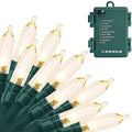 Close-up of warm white LED string lights with a green wire and a battery pack showing 8 modes and brand.