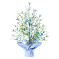 Artificial Easter egg tree tabletop decoration with blue eggs, white and blue flowers, and green leaves, tied with a blue burlap base.