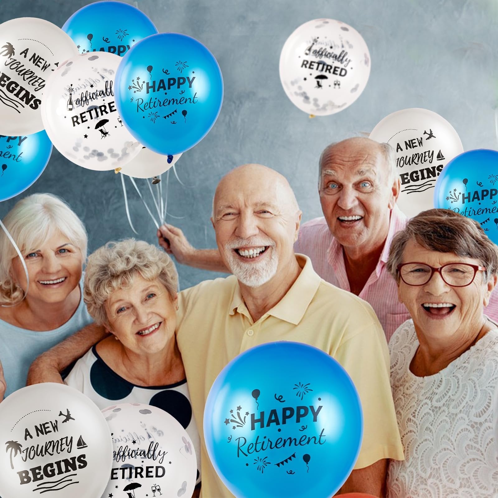 Group of smiling seniors holding blue and white retirement-themed balloons. Some balloons say 'Happy Retirement' and 'A New Journey Begins'.