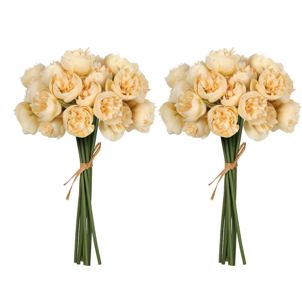 Two bouquets of champagne artificial peonies with green stems tied with twine on a white background
