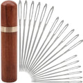 18-piece large-eye sewing needle set with a wooden storage tube, fanned out on a white background.