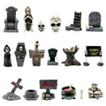 Collection of 18 Halloween miniature figurines including gravestones, grim reapers, skulls, and a cauldron.