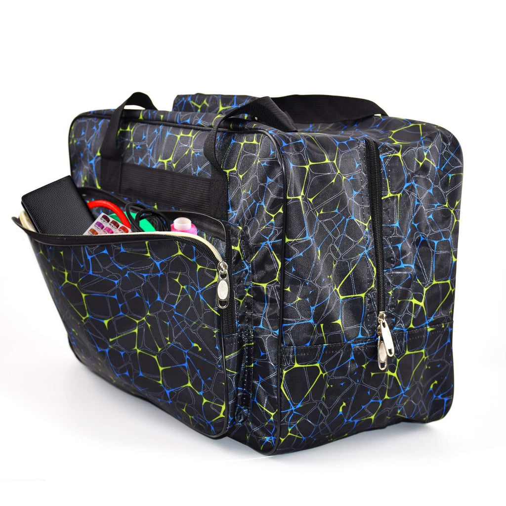 Black canvas sewing machine carrying case with blue and green geometric pattern, open front pocket showing contents.