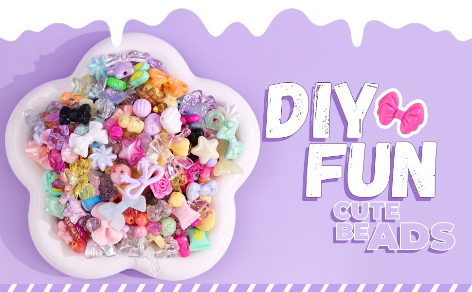 Assorted acrylic beads in various shapes including flowers, bows, stars, and candy, displayed in a white dish.